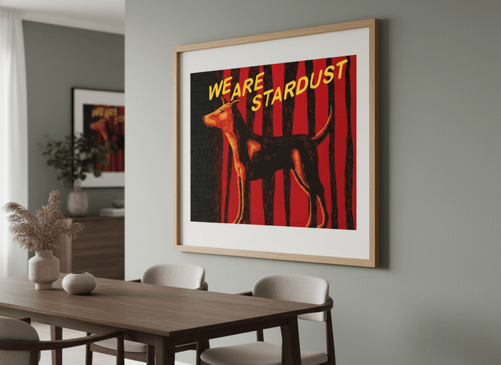 Wall art styled above a dining table in a contemporary home