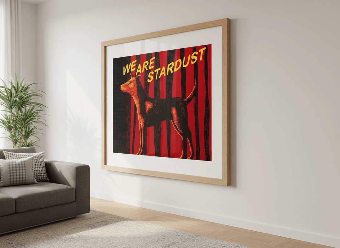 Modern wall art styled above a sofa in a neutral living room