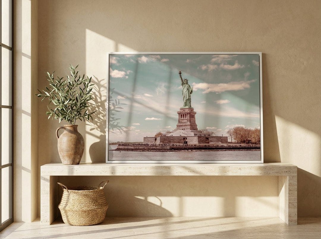 Canvas wall art with a white surround standing on a console in a Mediterranean living room