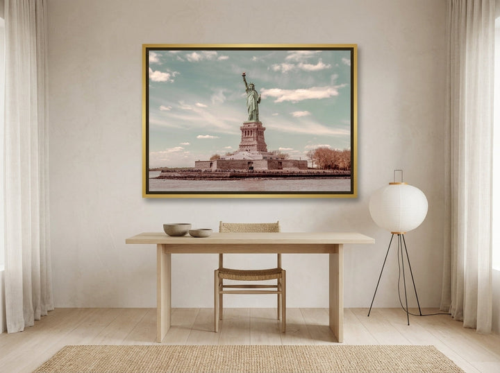 Canvas wall art with a gold leaf surround styled on the wall in a warm Japandi home office