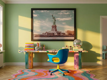 Modern wall art print styled on the wall in a colourful eclectic home office