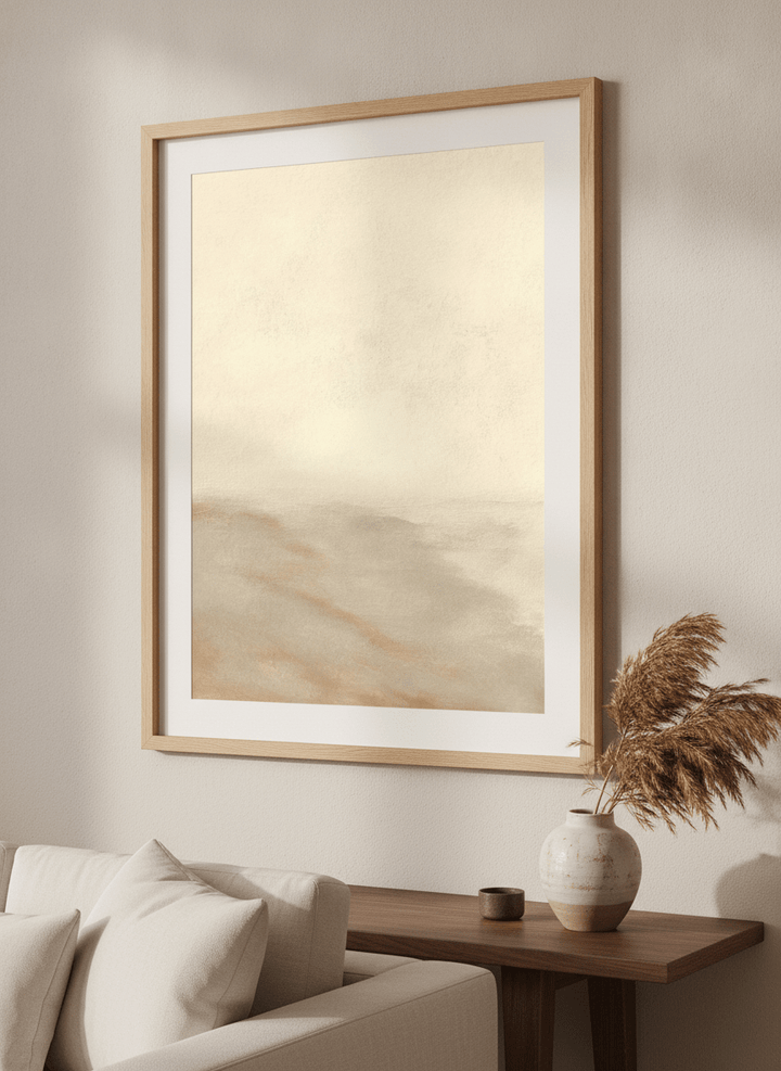 Modern wall art styled above a sofa in a neutral living room