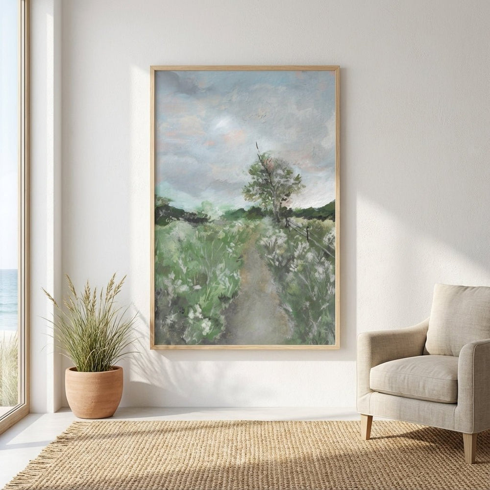 landscape painting on a wall in a room with a chair and plant.