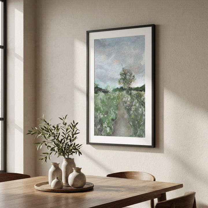 abstract painting on a wall above a wooden table with decorative vases and plants.