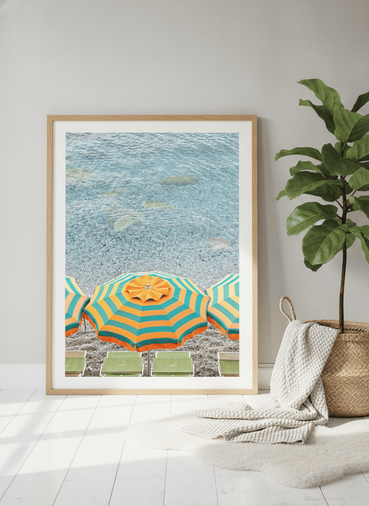 Modern wall art print leaning against the wall in a bright Scandinavian bathroom