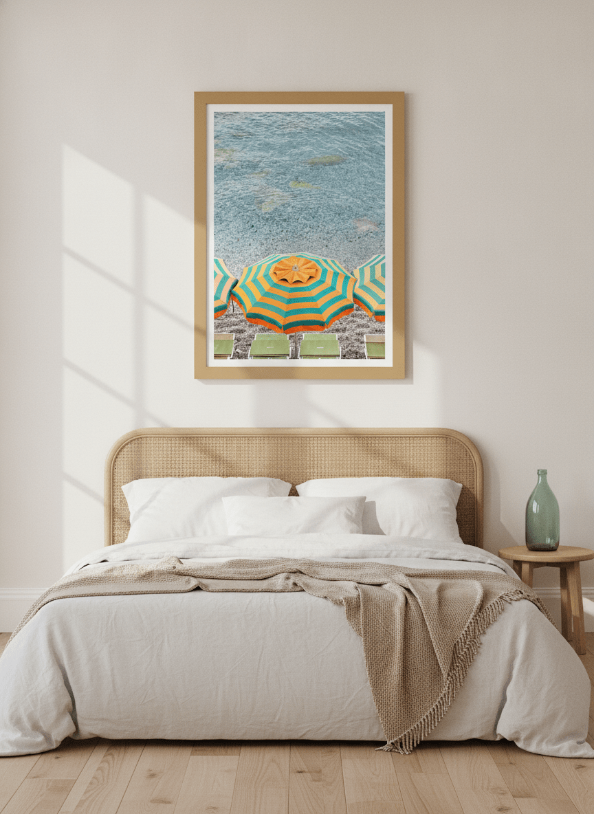 Modern wall art print styled on the wall in a coastal bedroom