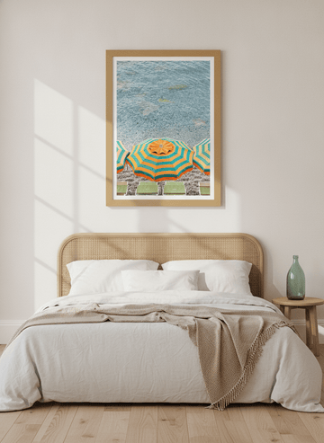 Modern wall art print styled on the wall in a coastal bedroom