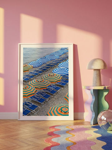 Modern wall art print leaning against the wall in a colourful eclectic living room