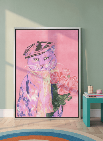 Oversized statement canvas wall art with a silver leaf surround leaning against the wall in a colourful eclectic living room