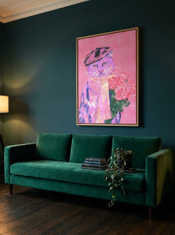 Oversized statement canvas wall art with a natural timber surround styled on the wall in a moody living room