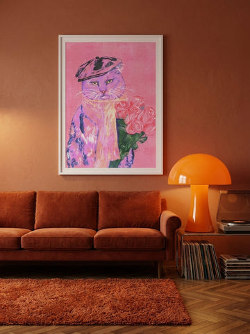 Modern wall art print styled on the wall in a retro 70s living room