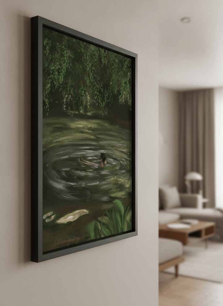 Modern wall art styled above a sofa in a neutral living room