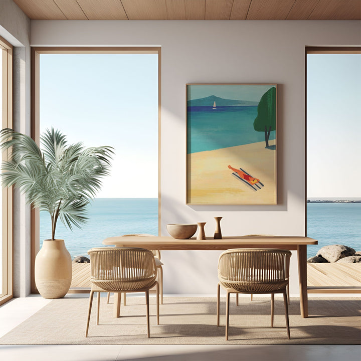 Dining room with a table and chairs, large windows, and a beach-themed painting.