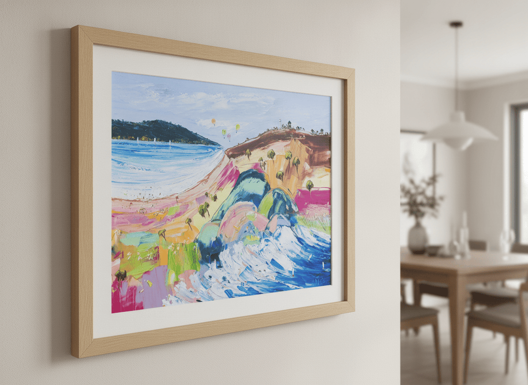 Wall art styled above a dining table in a contemporary home