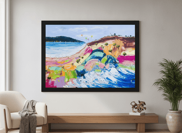 Modern wall art styled above a sofa in a neutral living room