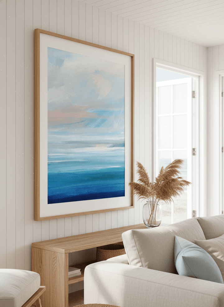 Neutral wall art displayed in a sunny coastal beach house