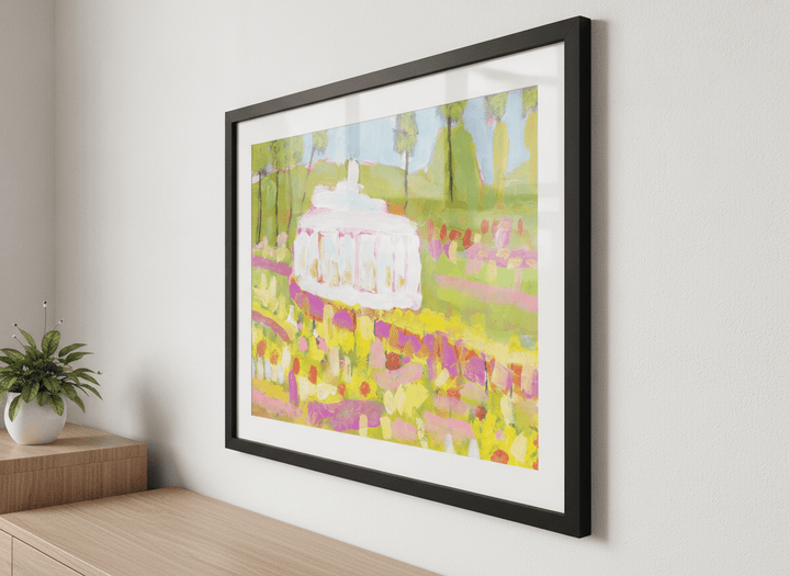 Minimalist artwork displayed in a calm, light-filled bedroom interior