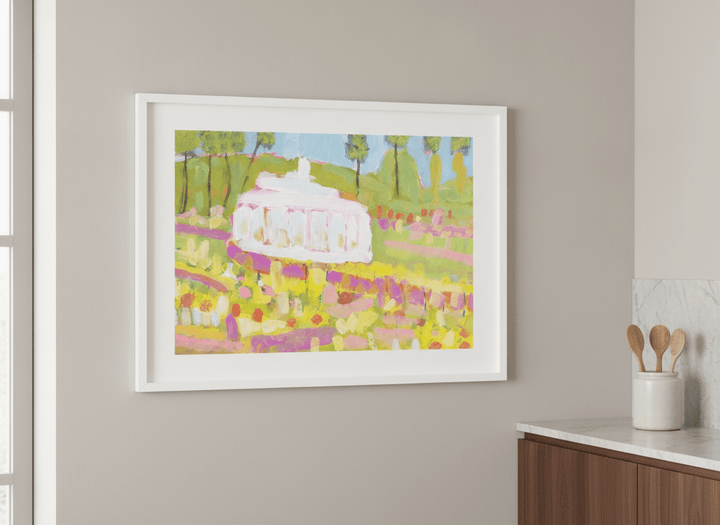 Artwork styled on the wall of a bright modern kitchen