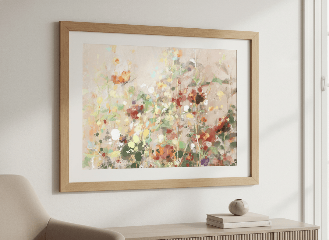 Modern wall art styled above a sofa in a neutral living room