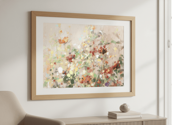 Modern wall art styled above a sofa in a neutral living room