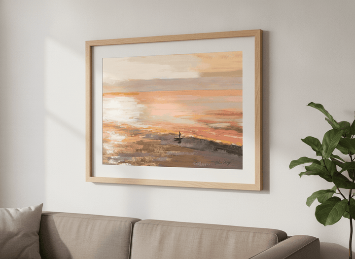 Modern wall art styled above a sofa in a neutral living room