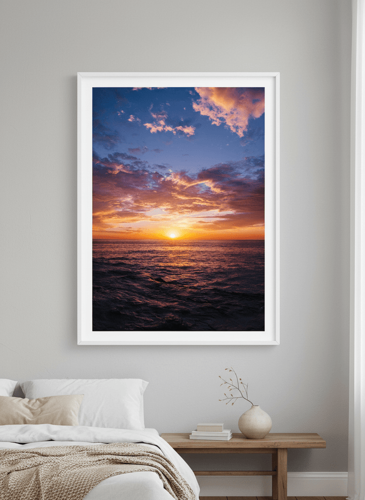 Minimalist artwork displayed in a calm, light-filled bedroom interior