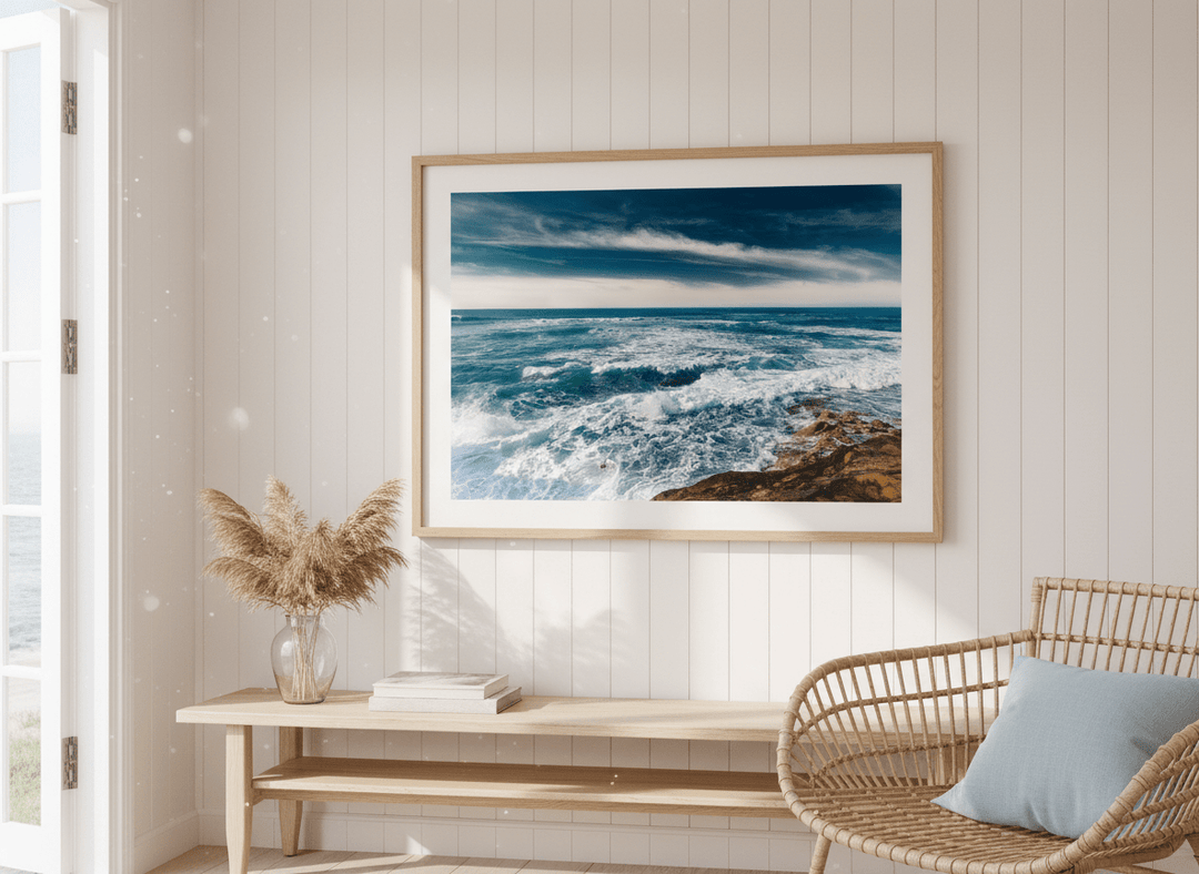 Neutral wall art displayed in a sunny coastal beach house