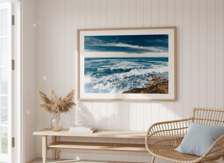Neutral wall art displayed in a sunny coastal beach house