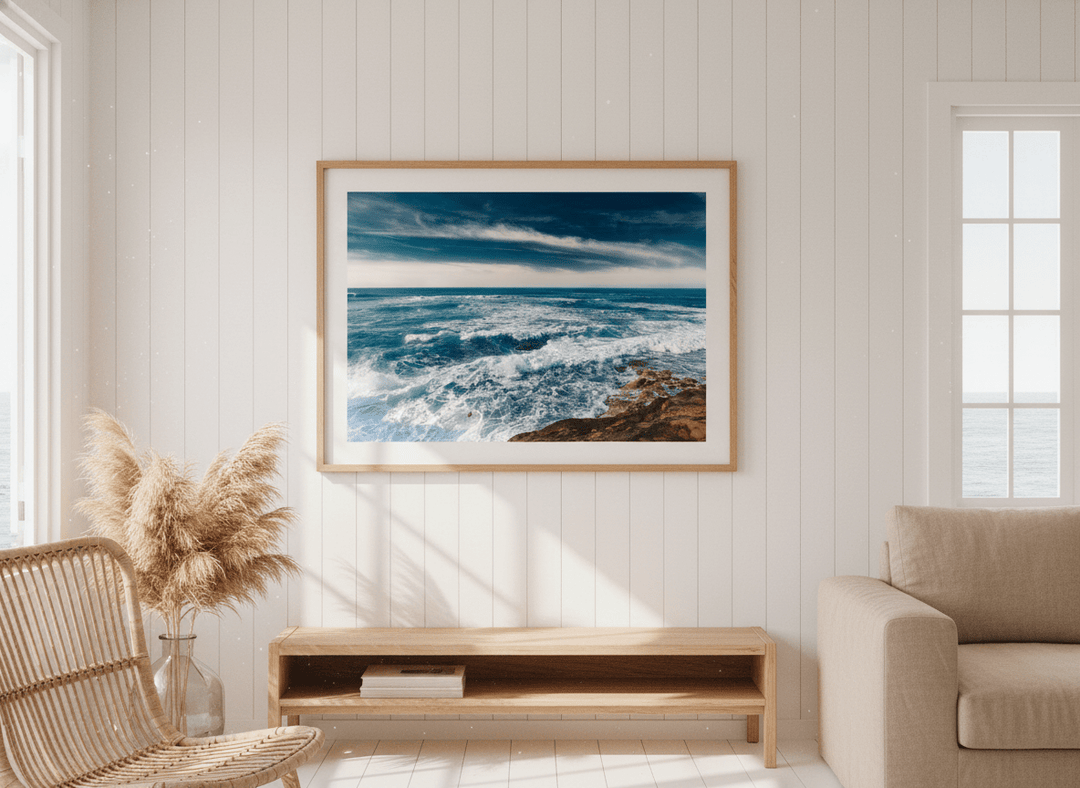 Neutral wall art displayed in a sunny coastal beach house