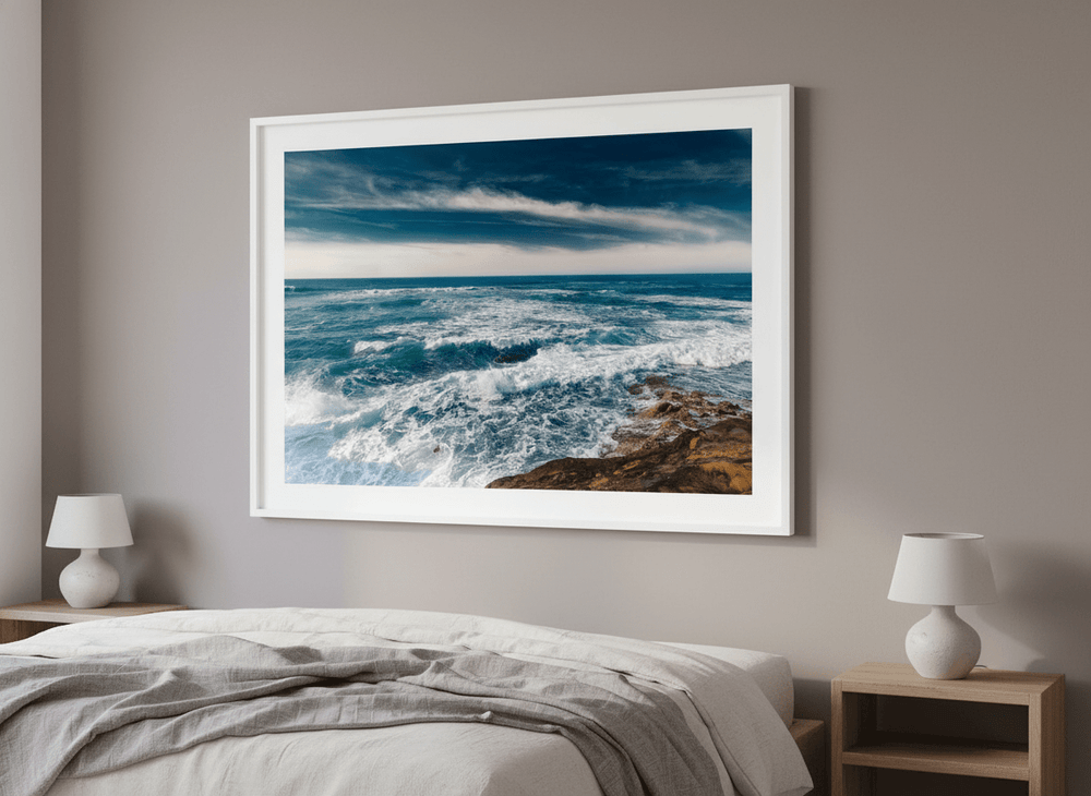 Minimalist artwork displayed in a calm, light-filled bedroom interior
