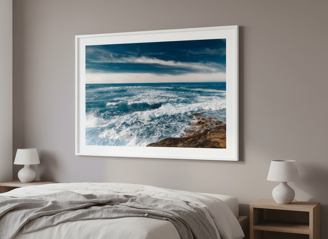Minimalist artwork displayed in a calm, light-filled bedroom interior