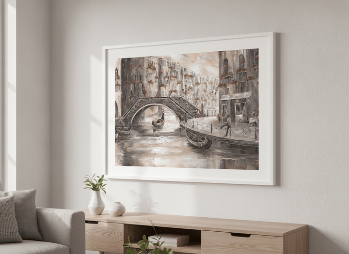 Modern wall art styled above a sofa in a neutral living room
