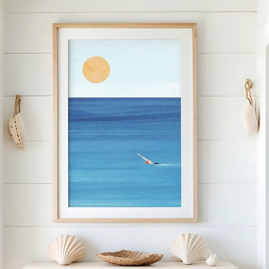 Nautical-themed interior with a seascape painting, shell decor, and a woven basket.