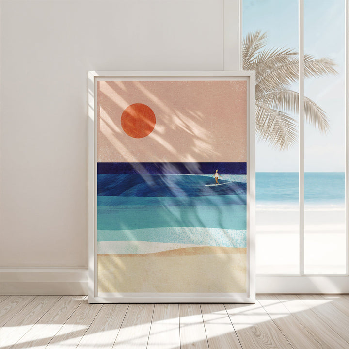 Artwork of a beach scene with a palm tree and sun, displayed on a wall.
