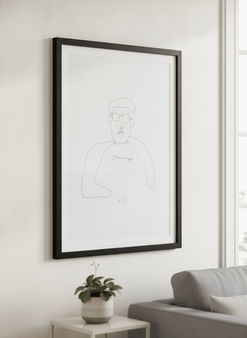 Modern wall art styled above a sofa in a neutral living room