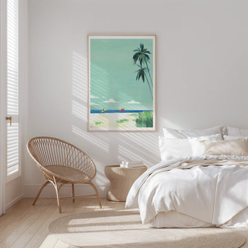 Bedroom with a beach scene painting on the wall, wicker chair, and bed.