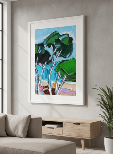 Modern wall art styled above a sofa in a neutral living room