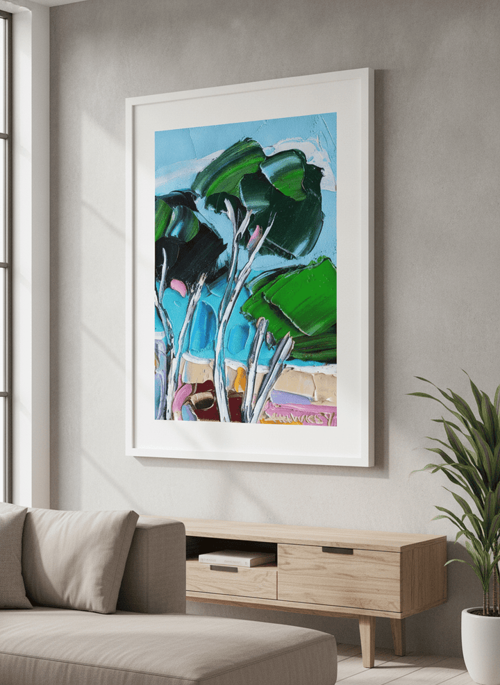 Modern wall art styled above a sofa in a neutral living room