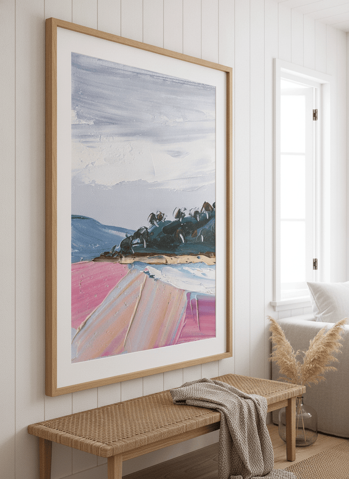Neutral wall art displayed in a sunny coastal beach house