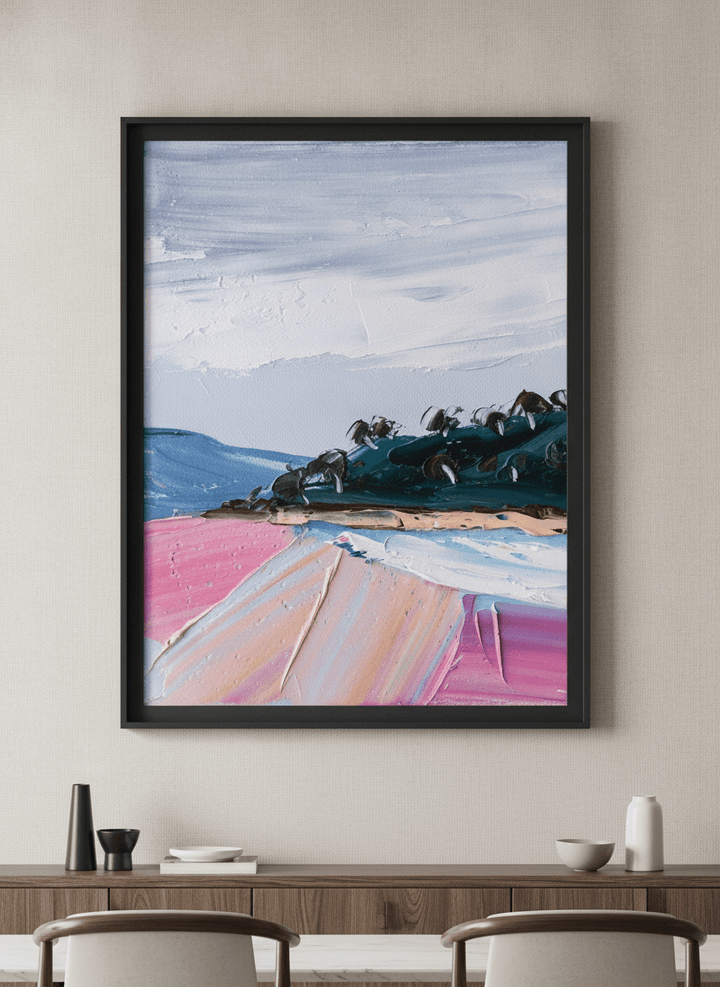Wall art styled above a dining table in a contemporary home