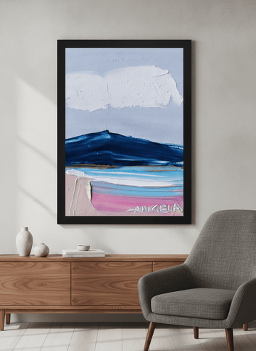 Modern wall art styled above a sofa in a neutral living room