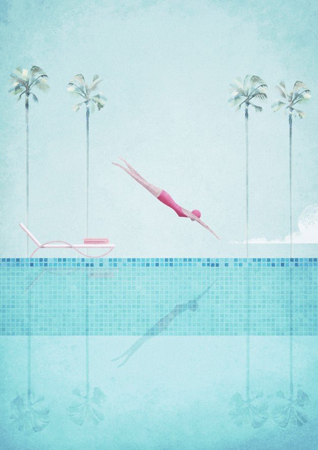 Two pink diving boards on a pool deck with palm trees in the background. framed