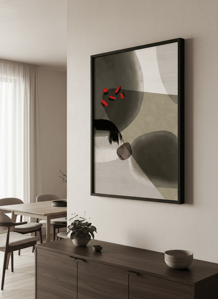 Wall art styled above a dining table in a contemporary home