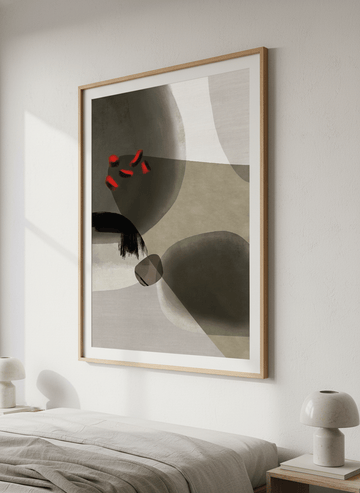 Minimalist artwork displayed in a calm, light-filled bedroom interior