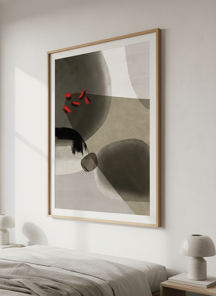 Minimalist artwork displayed in a calm, light-filled bedroom interior