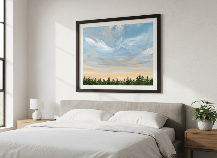Minimalist artwork displayed in a calm, light-filled bedroom interior