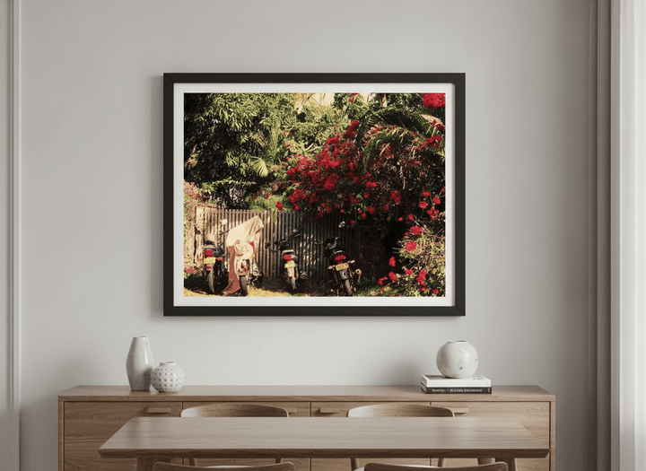 Wall art styled above a dining table in a contemporary home