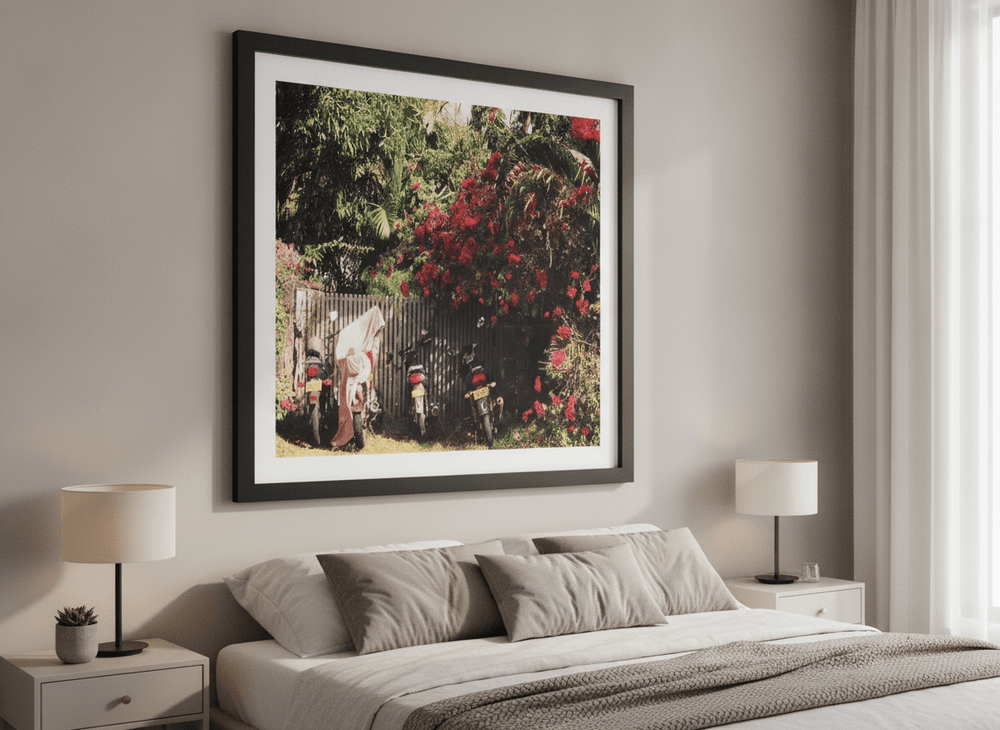 Minimalist artwork displayed in a calm, light-filled bedroom interior