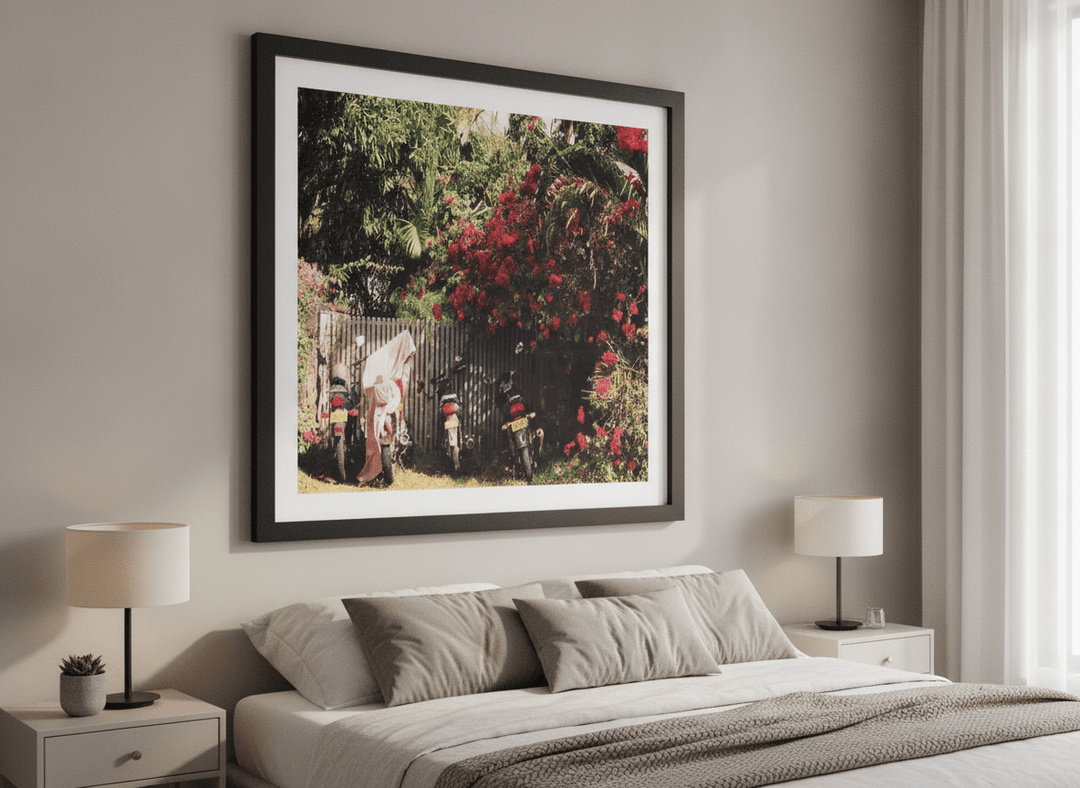 Minimalist artwork displayed in a calm, light-filled bedroom interior