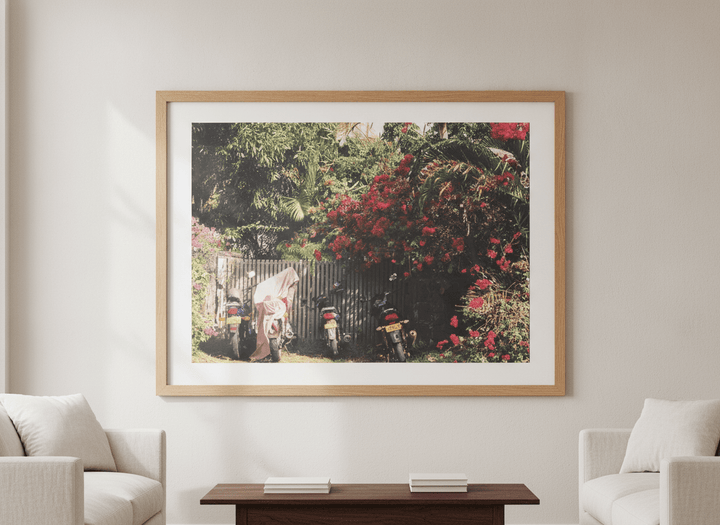 Modern wall art styled above a sofa in a neutral living room